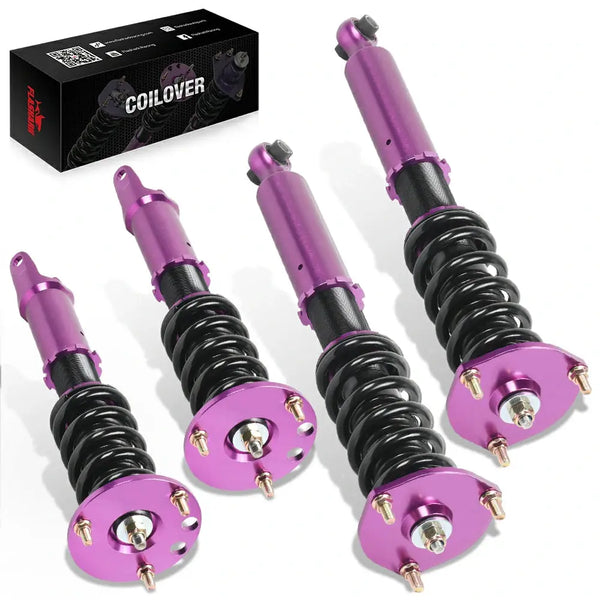 Four coilover struts for a 1992-2000 Toyota Supra MK4, purple camber plates over black bodies with purple lower tubes
